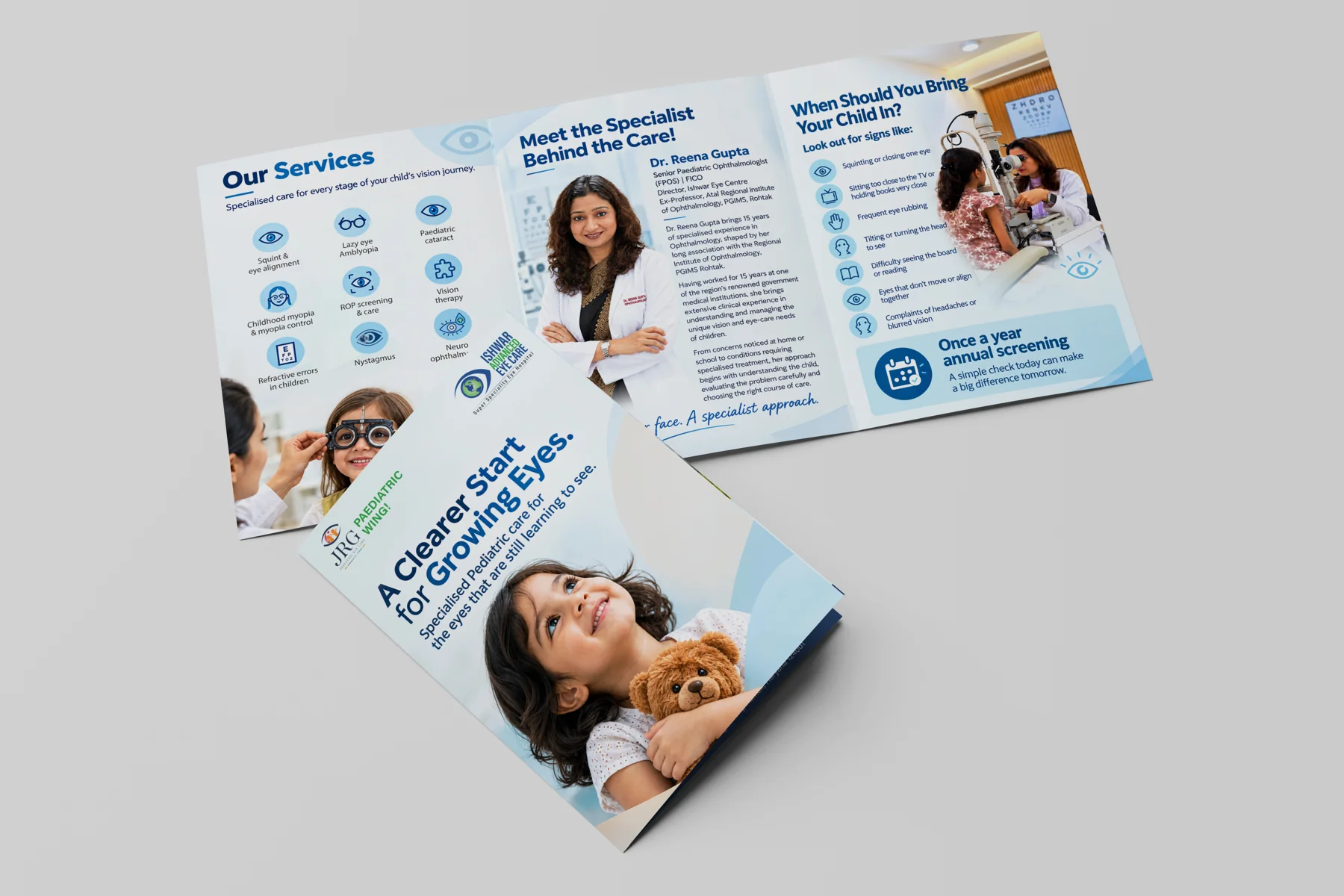 Click to view full size A5 tri-fold brochure for the JRG Paediatric Wing: the closed cover with a smiling child and teddy bear, and the open inside spread with services, the specialist and warning signs to look for