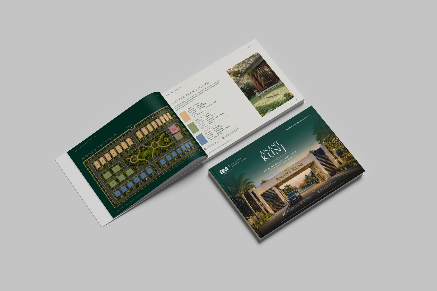 Click to view full size Open Anant Kunj brochure showing the master plan legend spread beside the closed cover