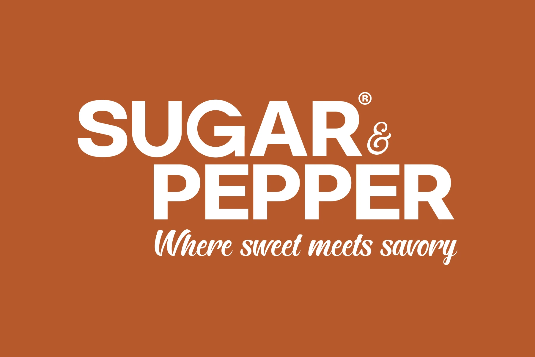 Sugar & Pepper reversed white logo on a terracotta background