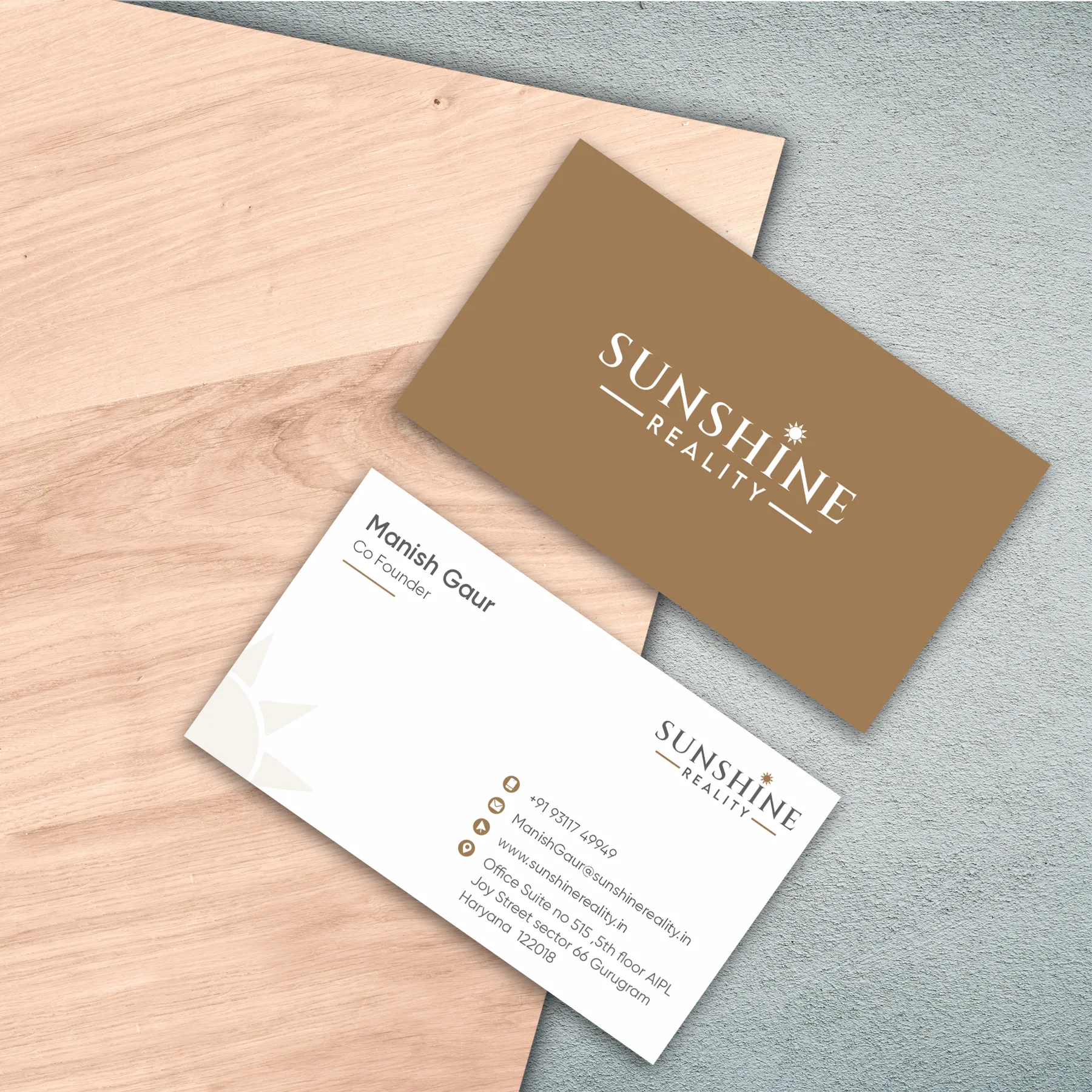 Click to view full size Sunshine Reality brown visiting card for co-founder Manish Gaur, Gurgaon