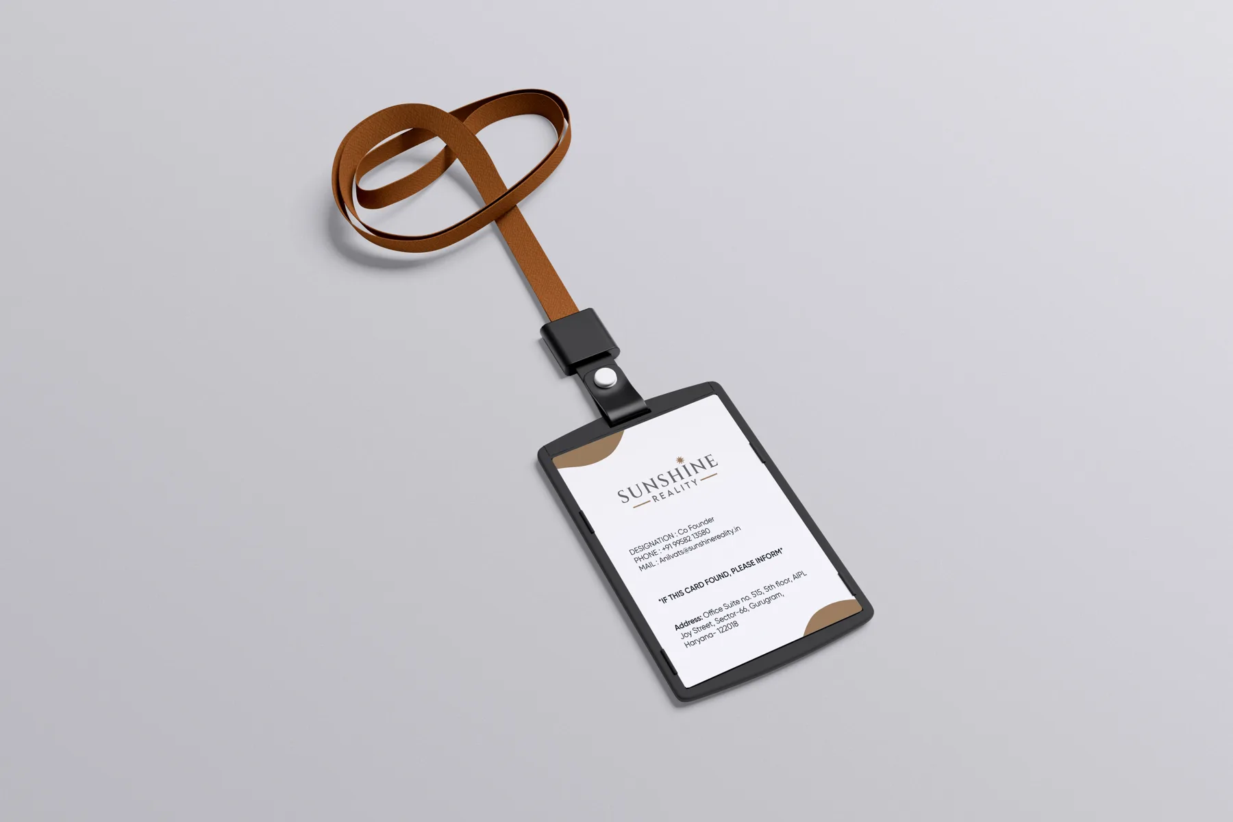 Click to view full size Sunshine Reality employee ID card with brown lanyard